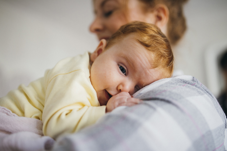 An image of a woman holding a baby