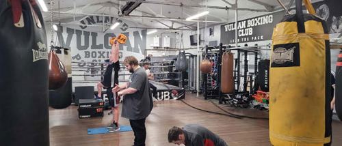 Men in a gym working out
