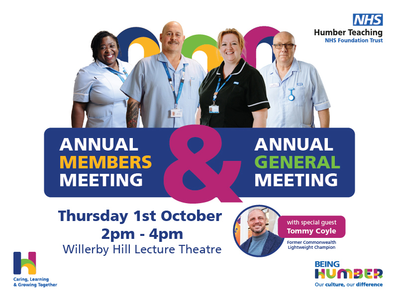 A picture of the AMM/AGM for 2026 with pictures of Trust staff visible