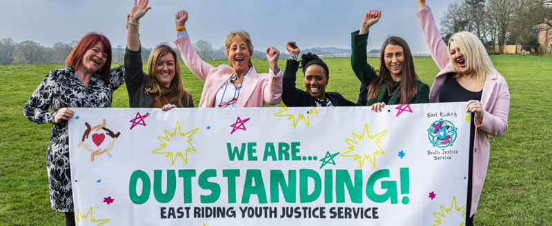 A picture of the East Riding Youth Justice Service receiving an outstanding inspection