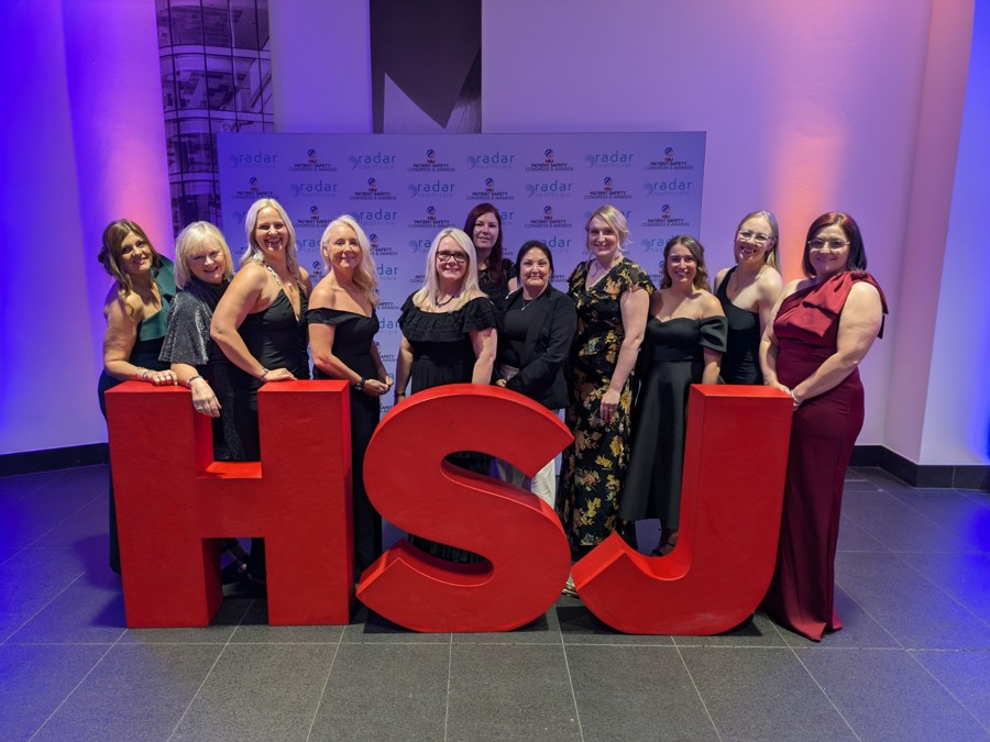 HSJ awards ceremony, there are three big letters spelling HSJ and members of the Humber Trust team stood posing for pictures.